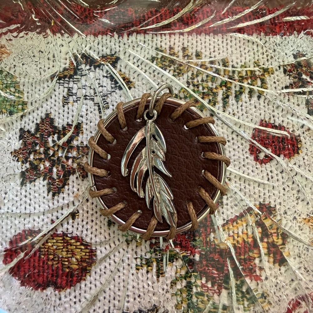 Brown Leather Pendant with Silver Feather